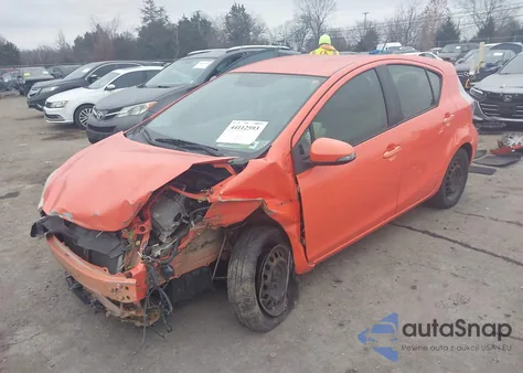 2014 Toyota Prius C One from USA, damaged, VIN JTDKDTB36E1062445